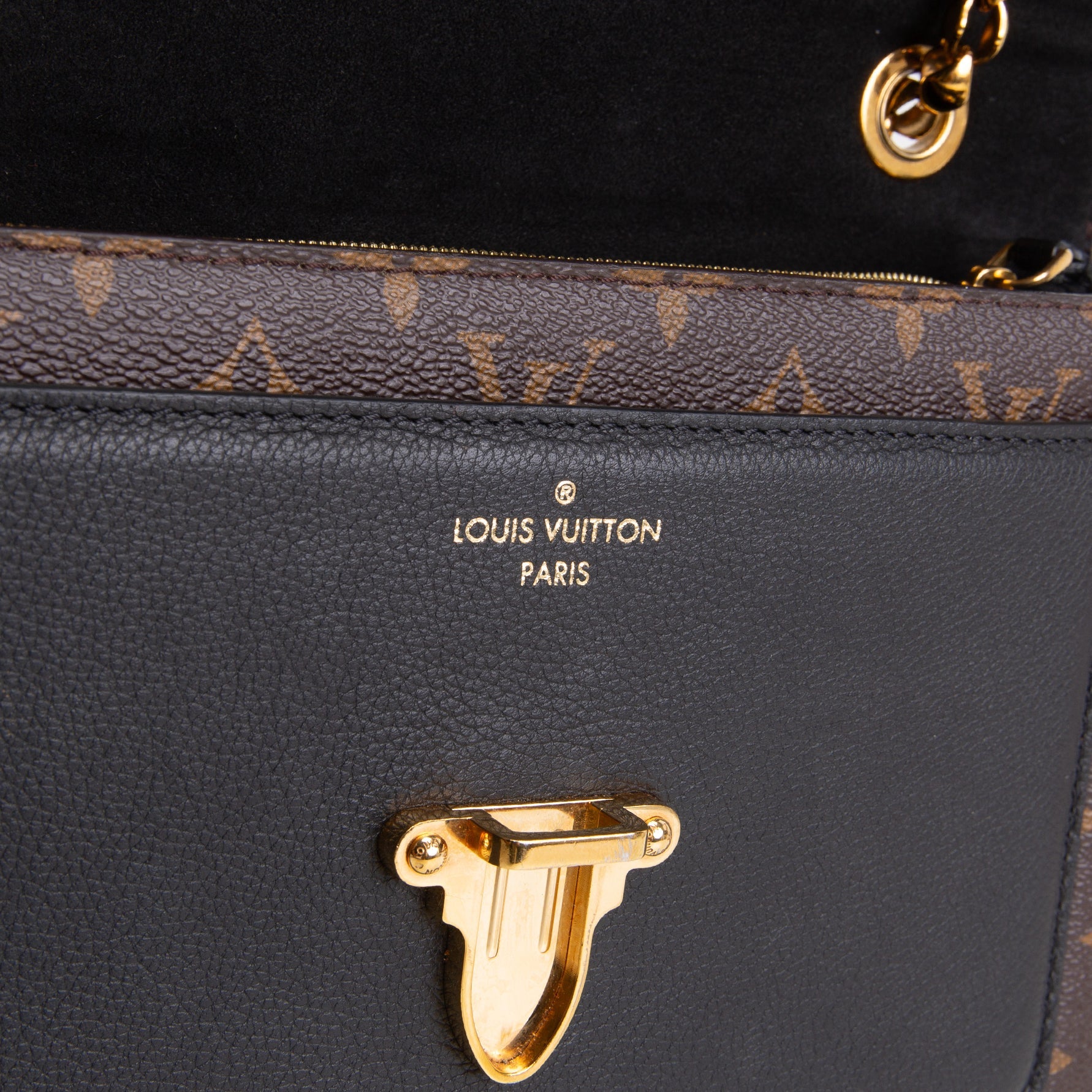 LOUIS VUITTON Victoire Monogram Handbag