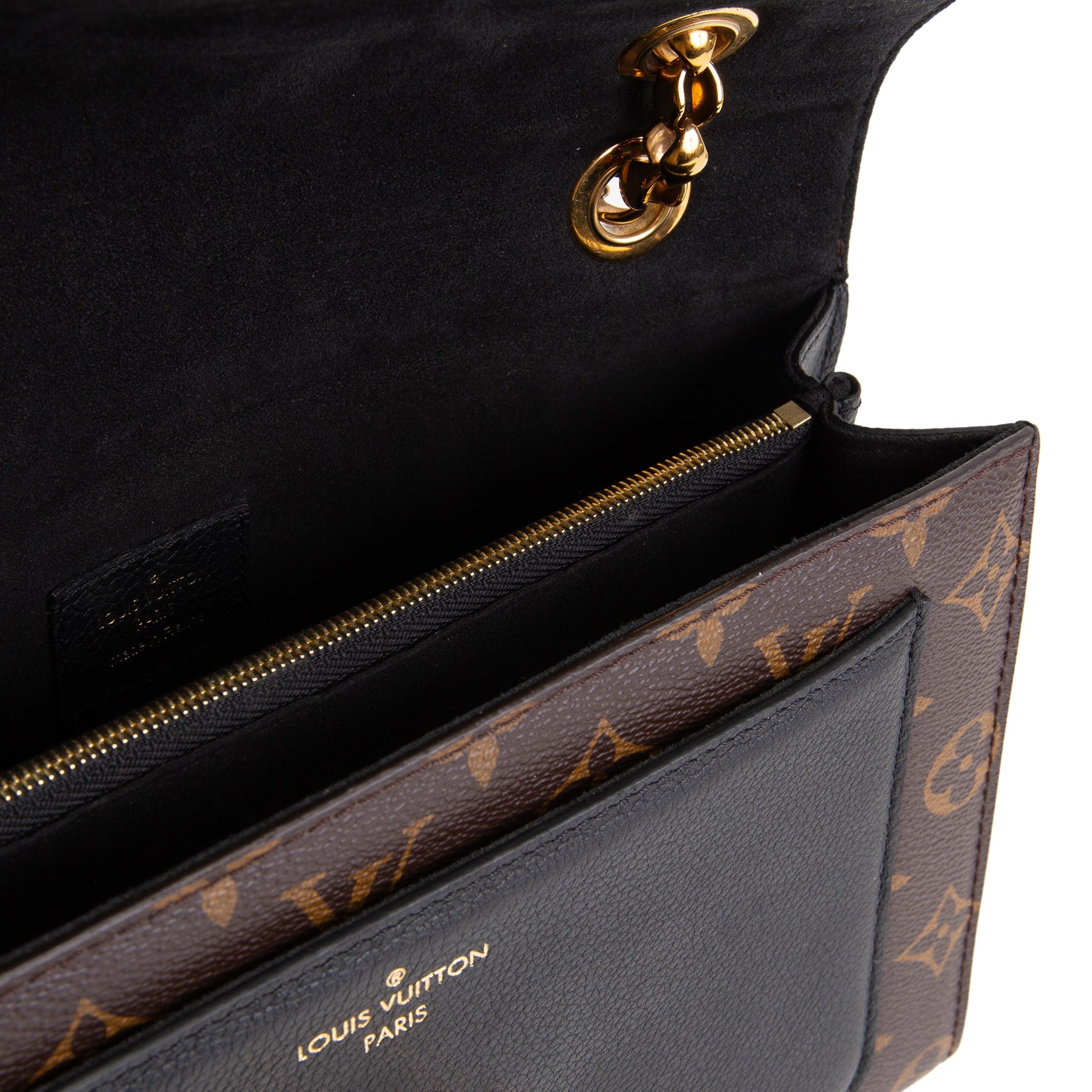 LOUIS VUITTON Victoire Monogram Handbag