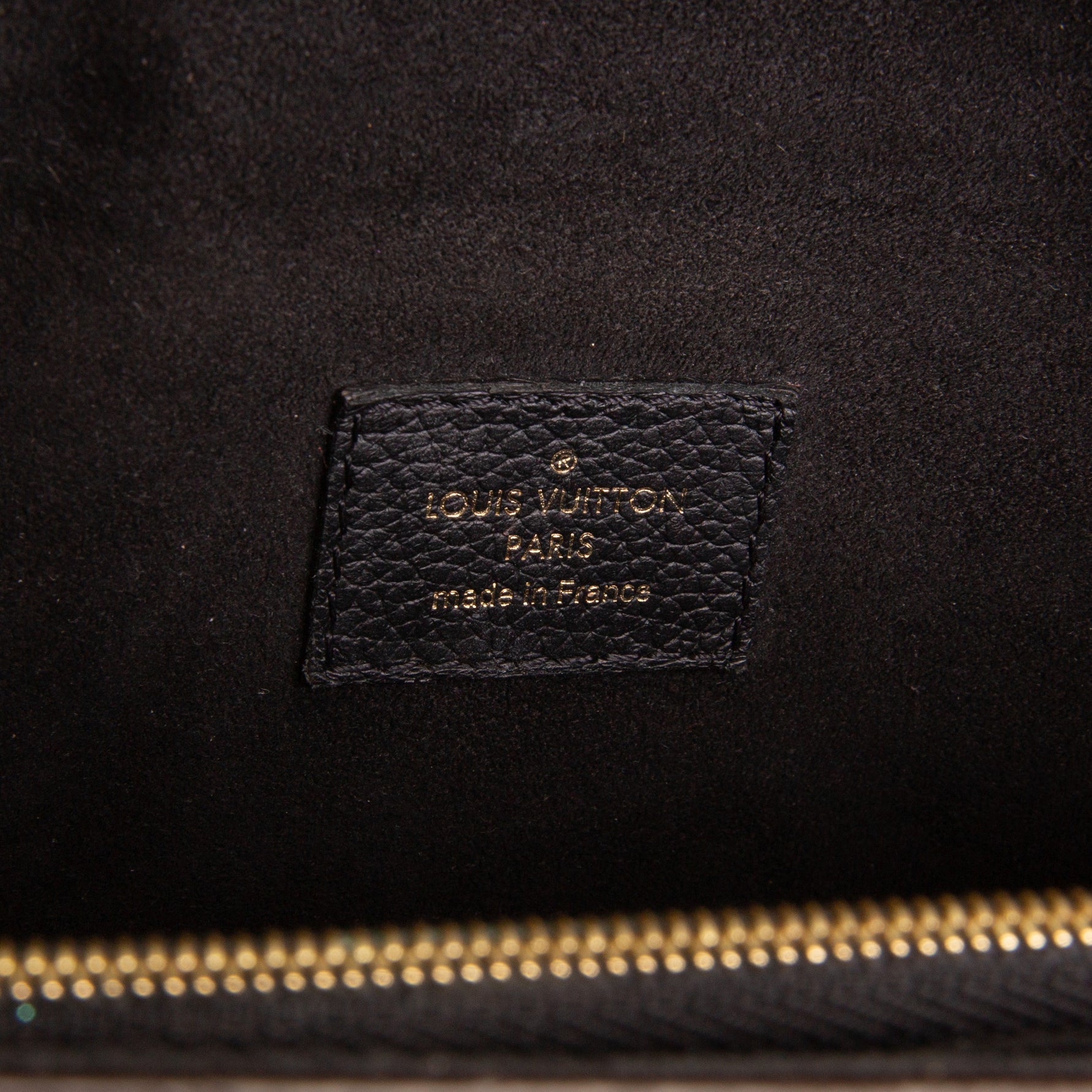 LOUIS VUITTON Victoire Monogram Handbag
