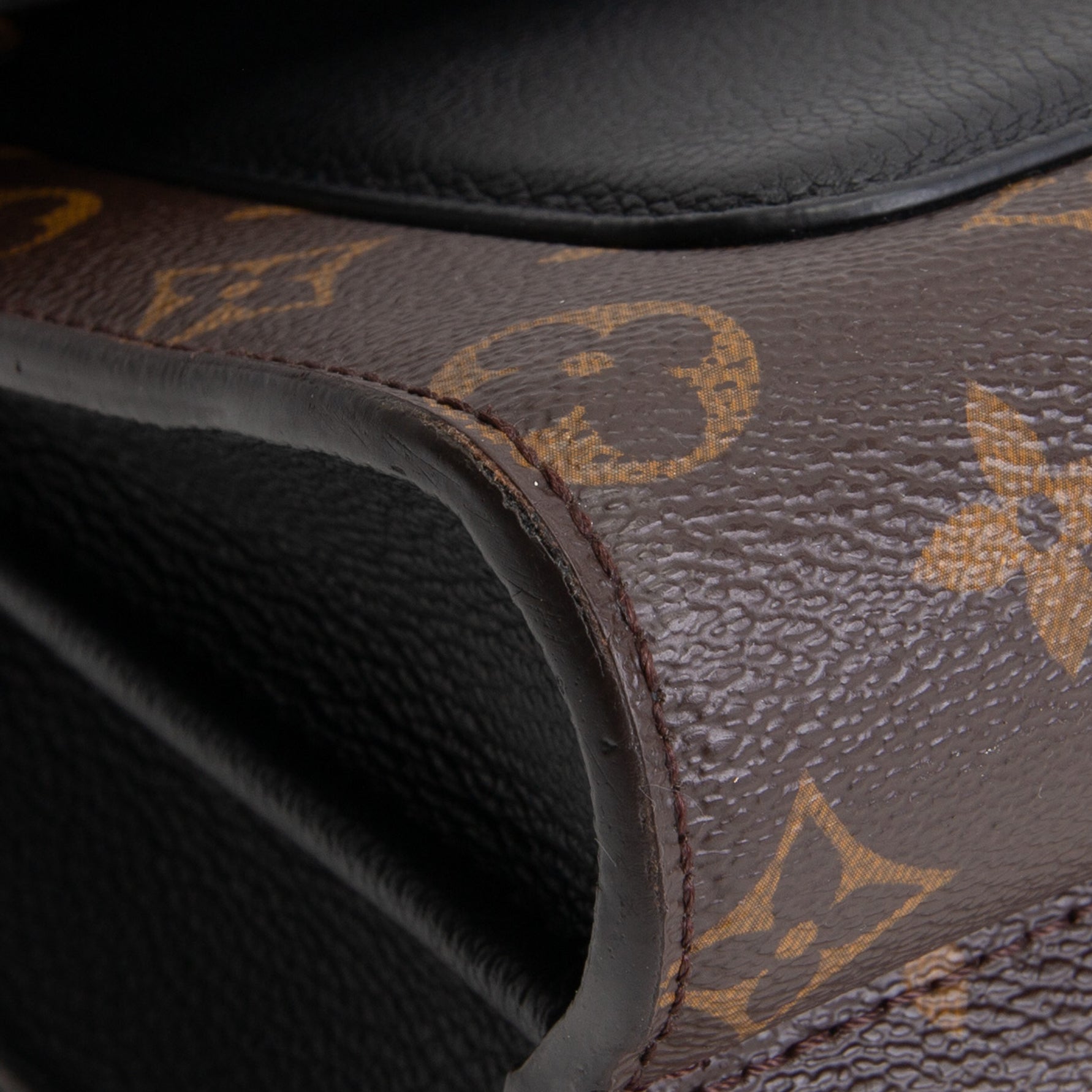 LOUIS VUITTON Victoire Monogram Handbag
