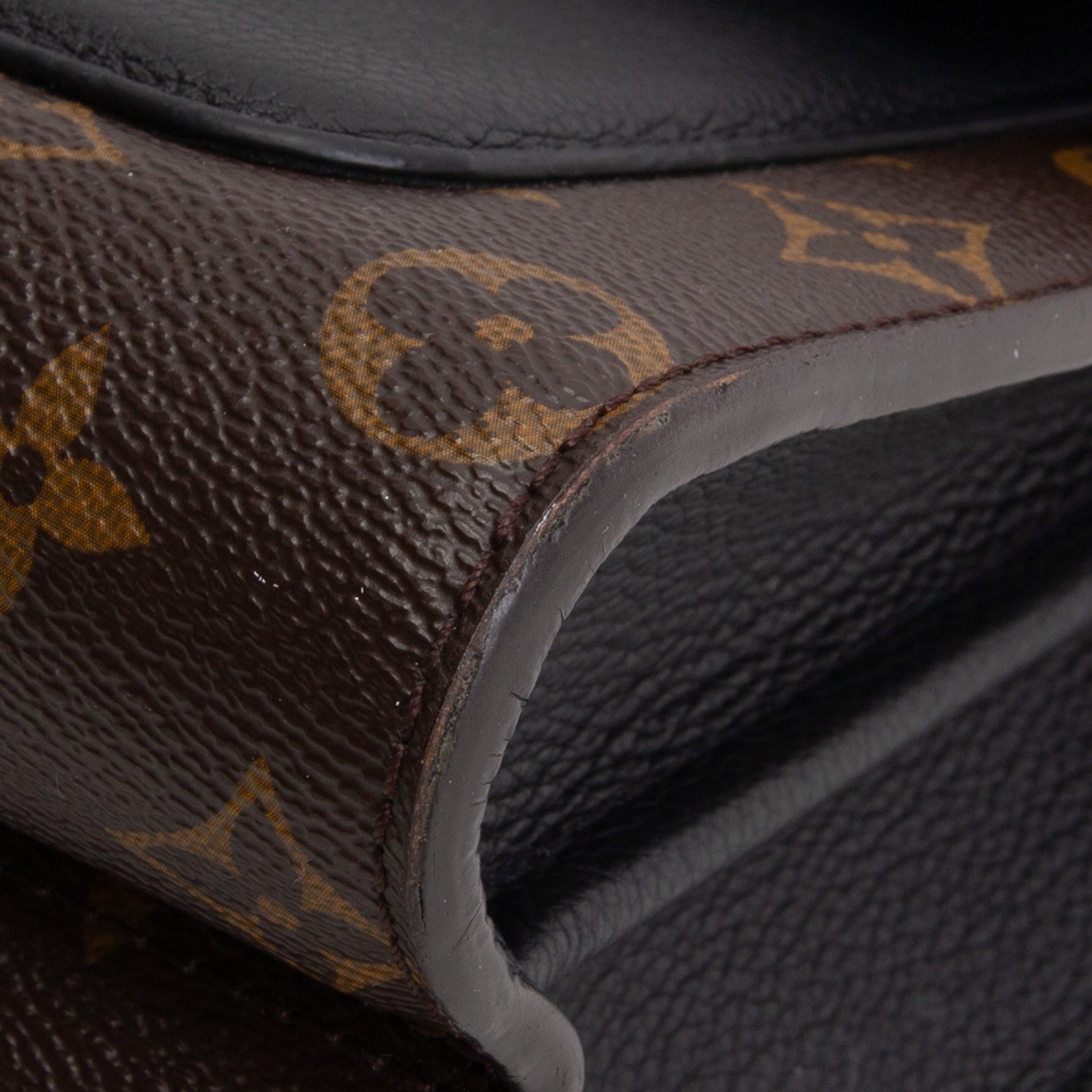 LOUIS VUITTON Victoire Monogram Handbag