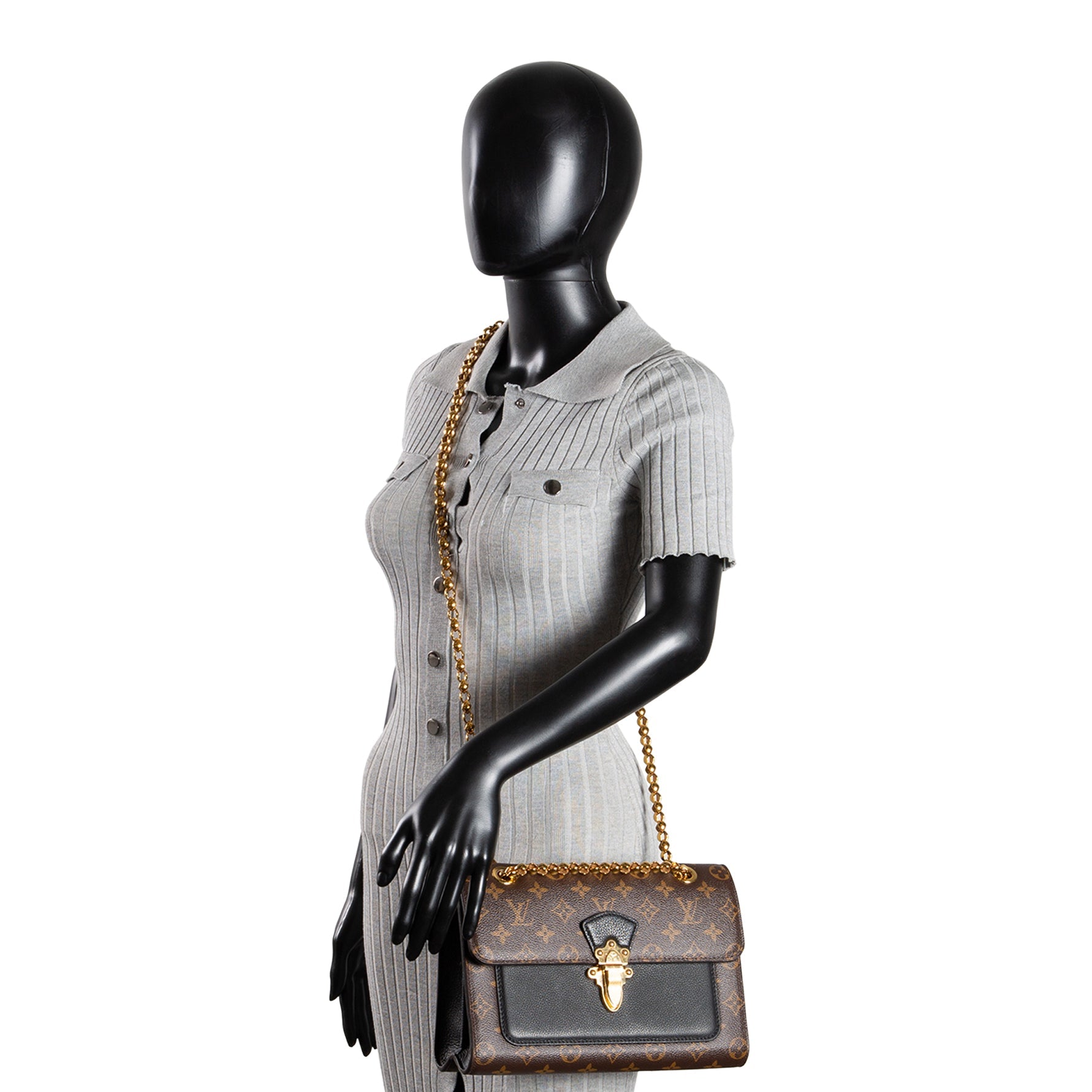 LOUIS VUITTON Victoire Monogram Handbag